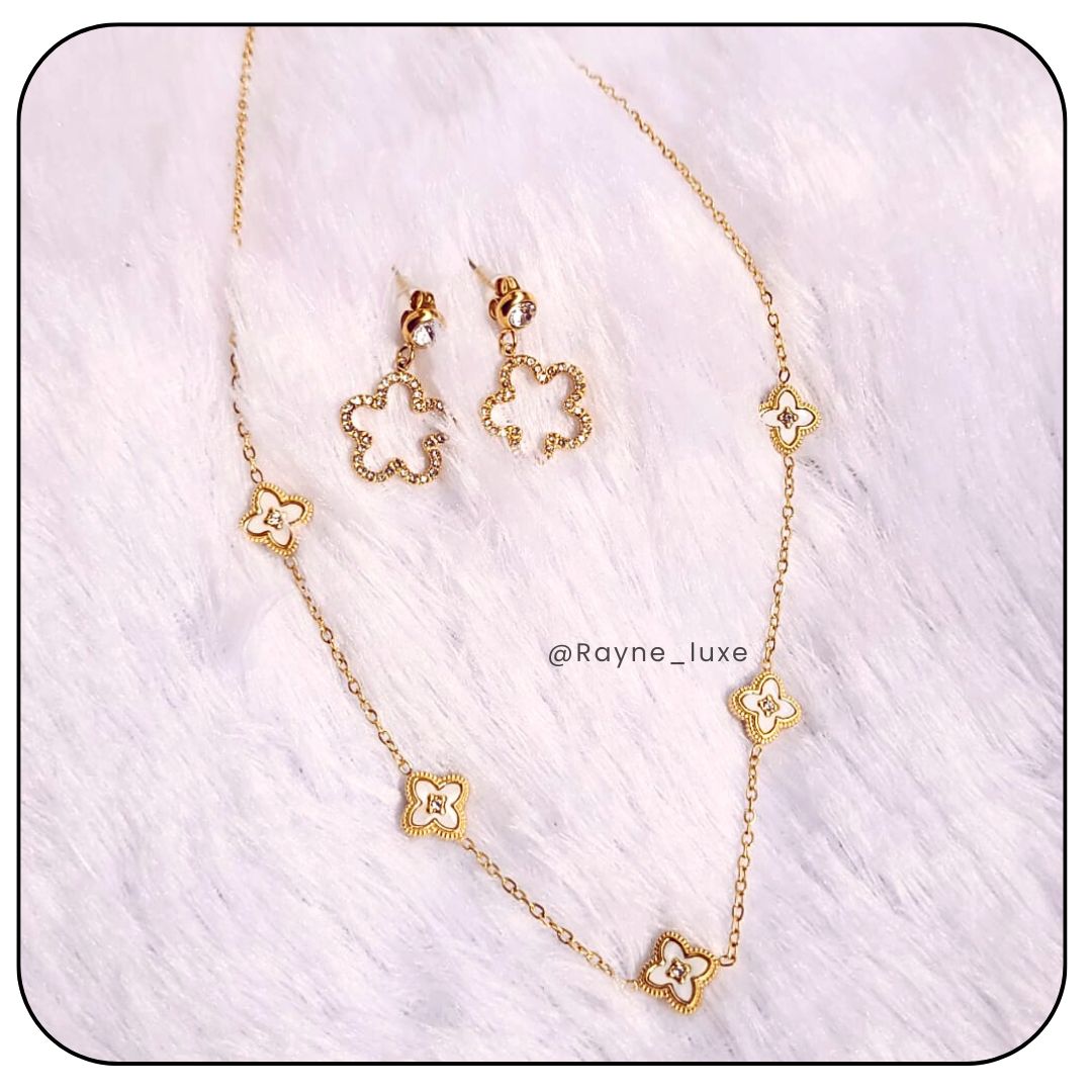 Elegant Reversible Clover Necklace & Earring Set – Dual-Tone Black & White Charms