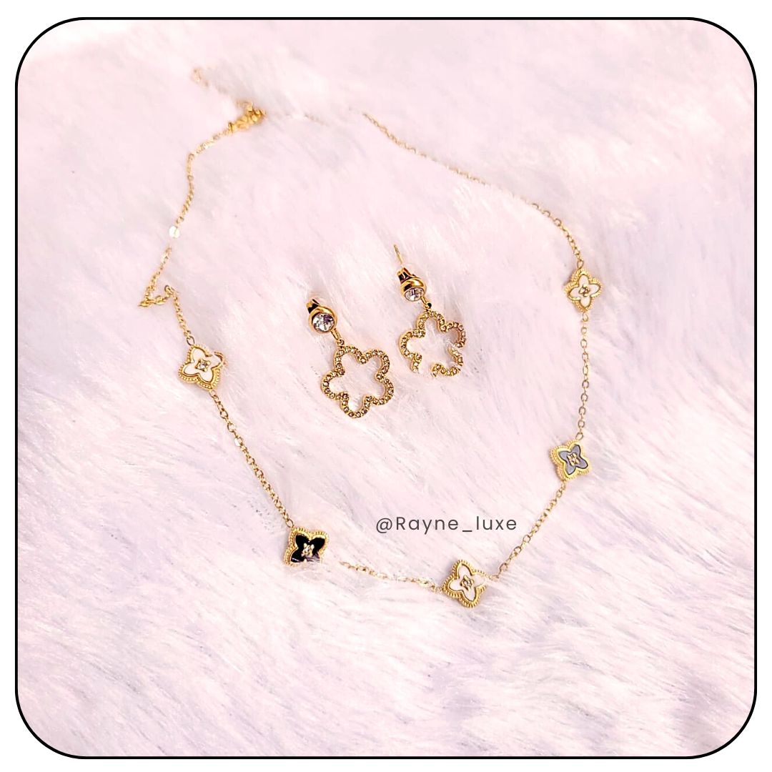 Elegant Reversible Clover Necklace & Earring Set – Dual-Tone Black & White Charms