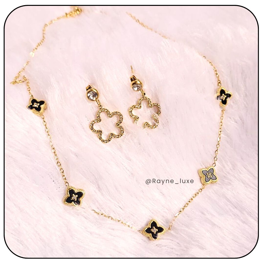 Elegant Reversible Clover Necklace & Earring Set – Dual-Tone Black & White Charms
