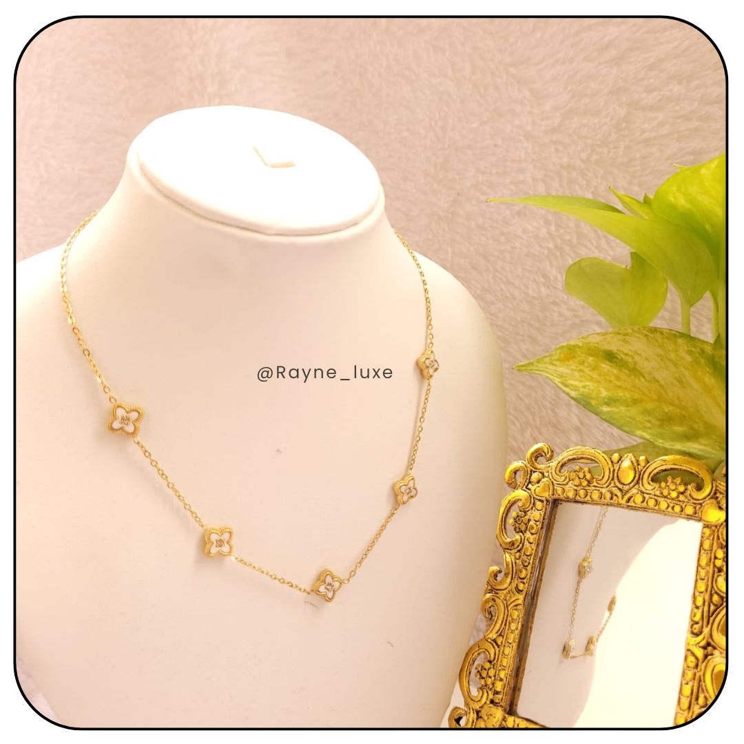 Elegant Reversible Clover Necklace & Earring Set – Dual-Tone Black & White Charms