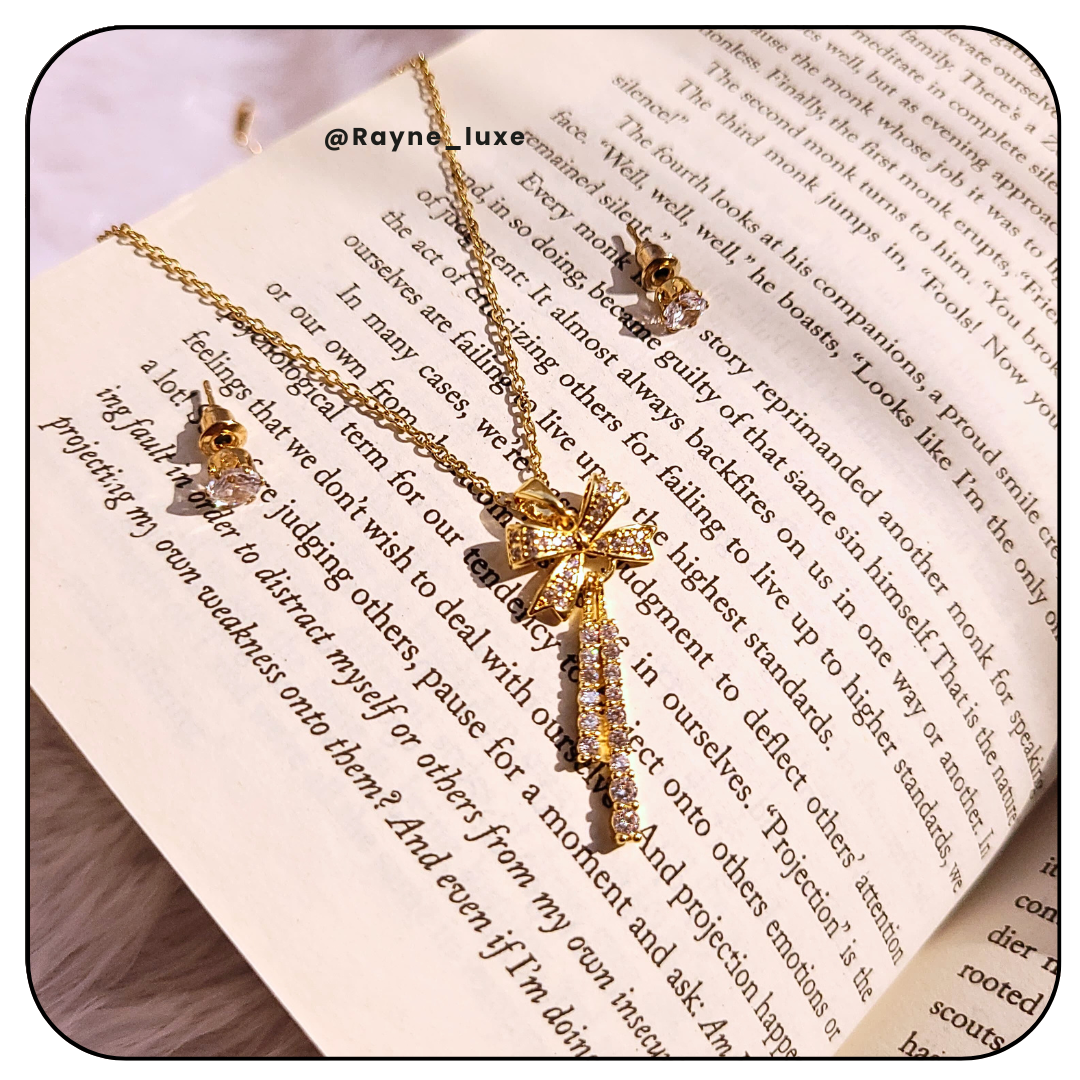 Golden crystal-studded bow pendant Necklace Set