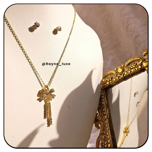 Golden crystal-studded bow pendant Necklace Set