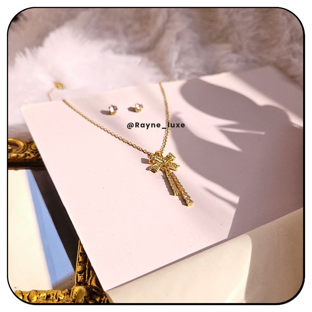 Golden crystal-studded bow pendant Necklace Set
